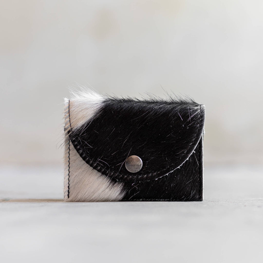 Portafoglio in pelle di mucca con bottone a pressione